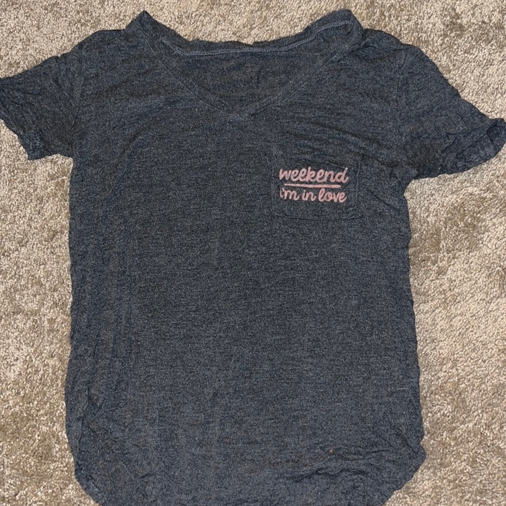 Super soft, stretchy dark grey shirt. I think I got her at Walmart.